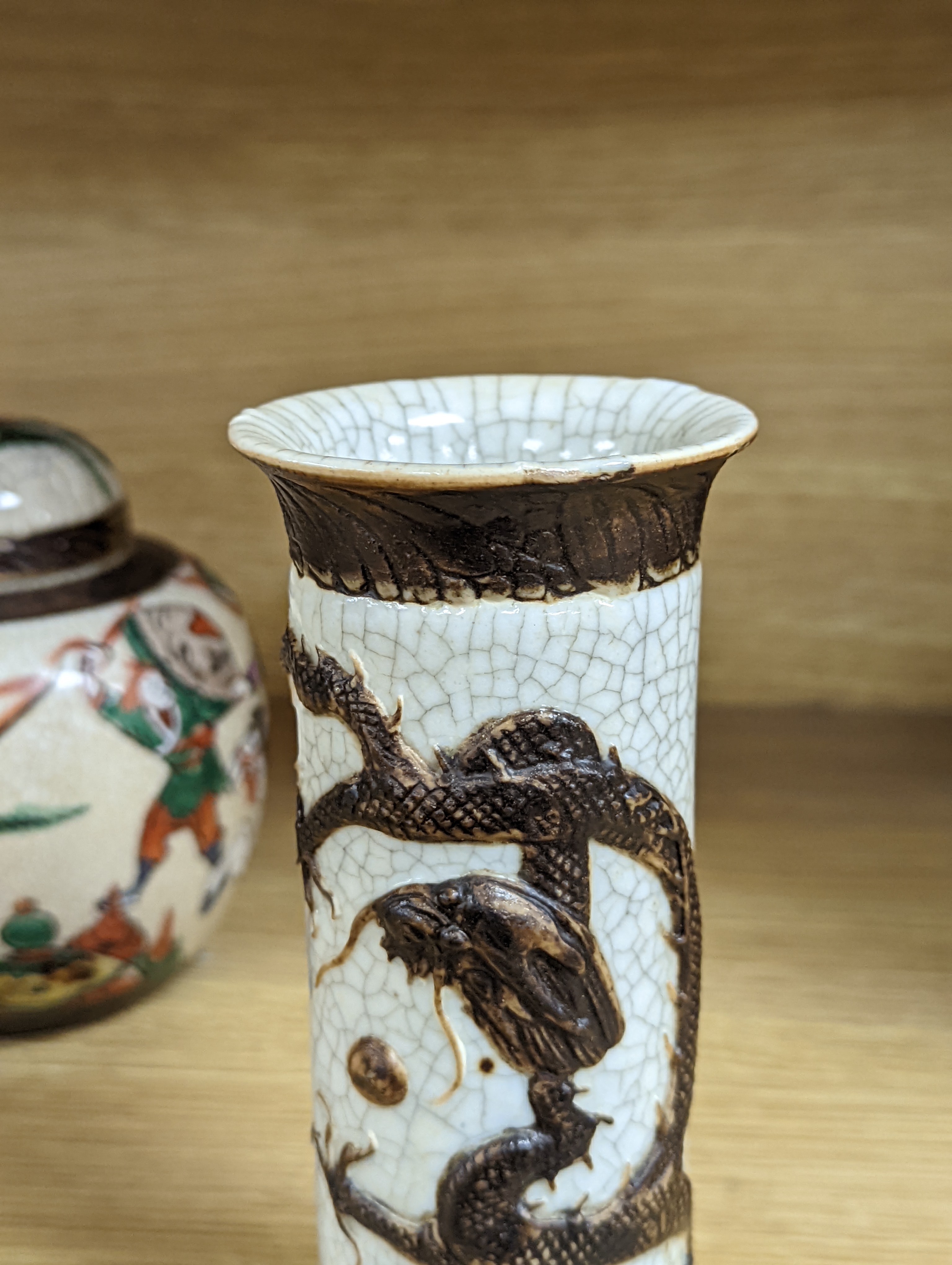 A Chinese famille verte crackle glaze jar and cover, 14.5cm, two famille rose dishes and a crackle glaze ‘dragon’ vase, all late 19th/early 20th century